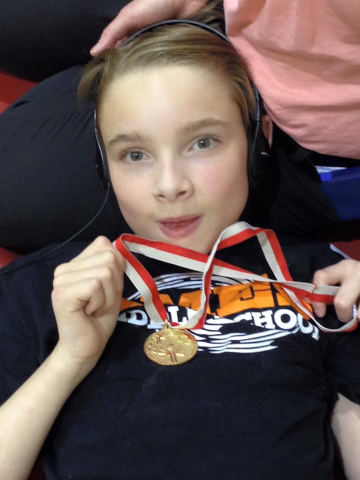 Tye_Sodders_with_Gold_Medal_Electric_Wheelchair_Race